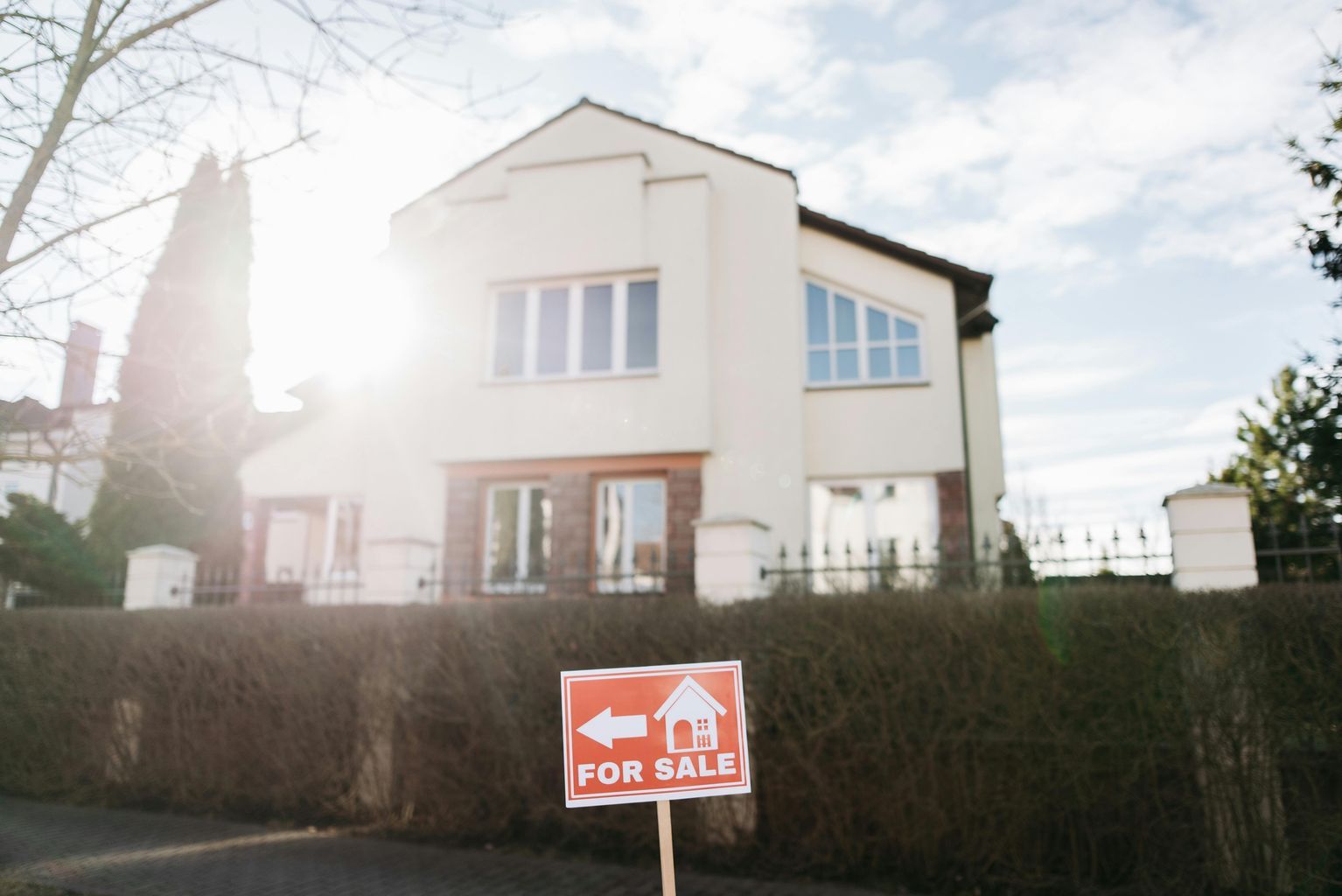 A Signage in Front of a House