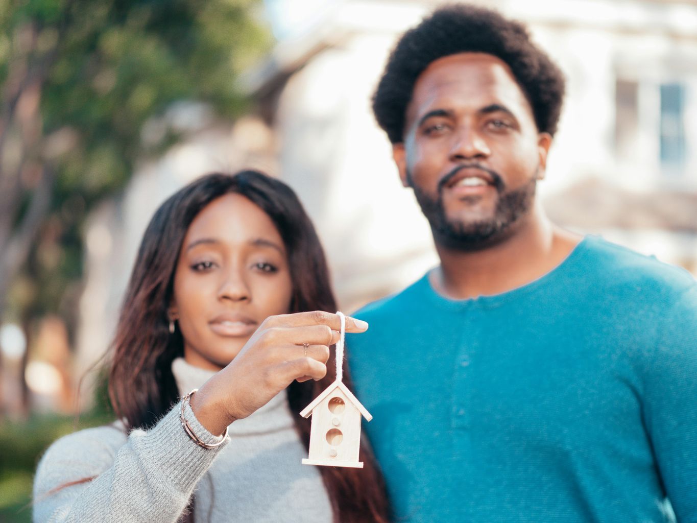 Man in Blue Long Sleeve Crew Neck Shirt Beside Woman in Gray Sweater