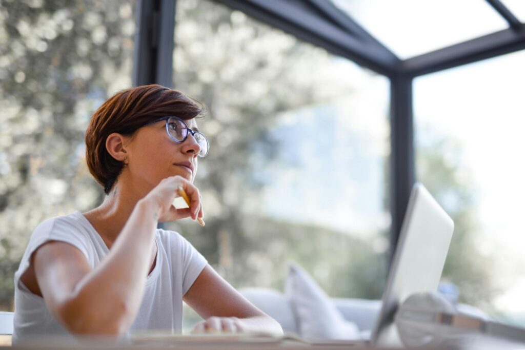 Photo of Woman in Deep Thought